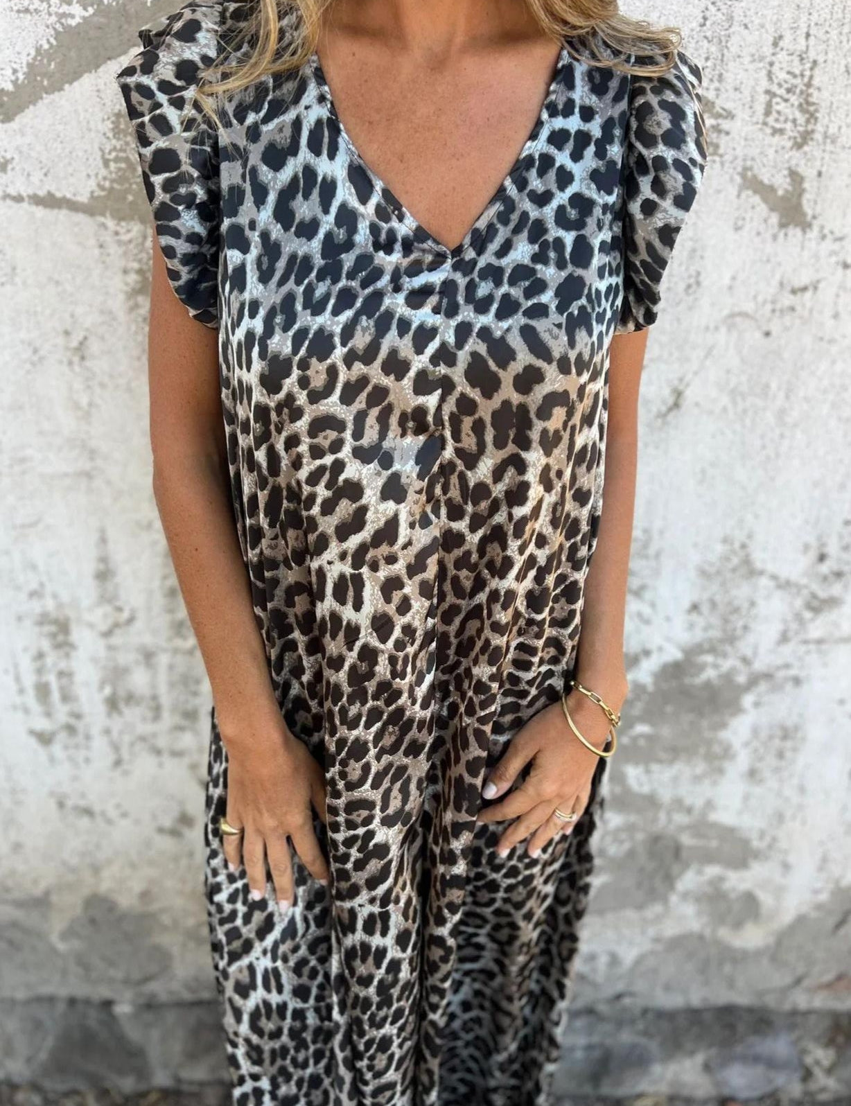 Mono sin mangas para mujer con cuello en V y bolsillos