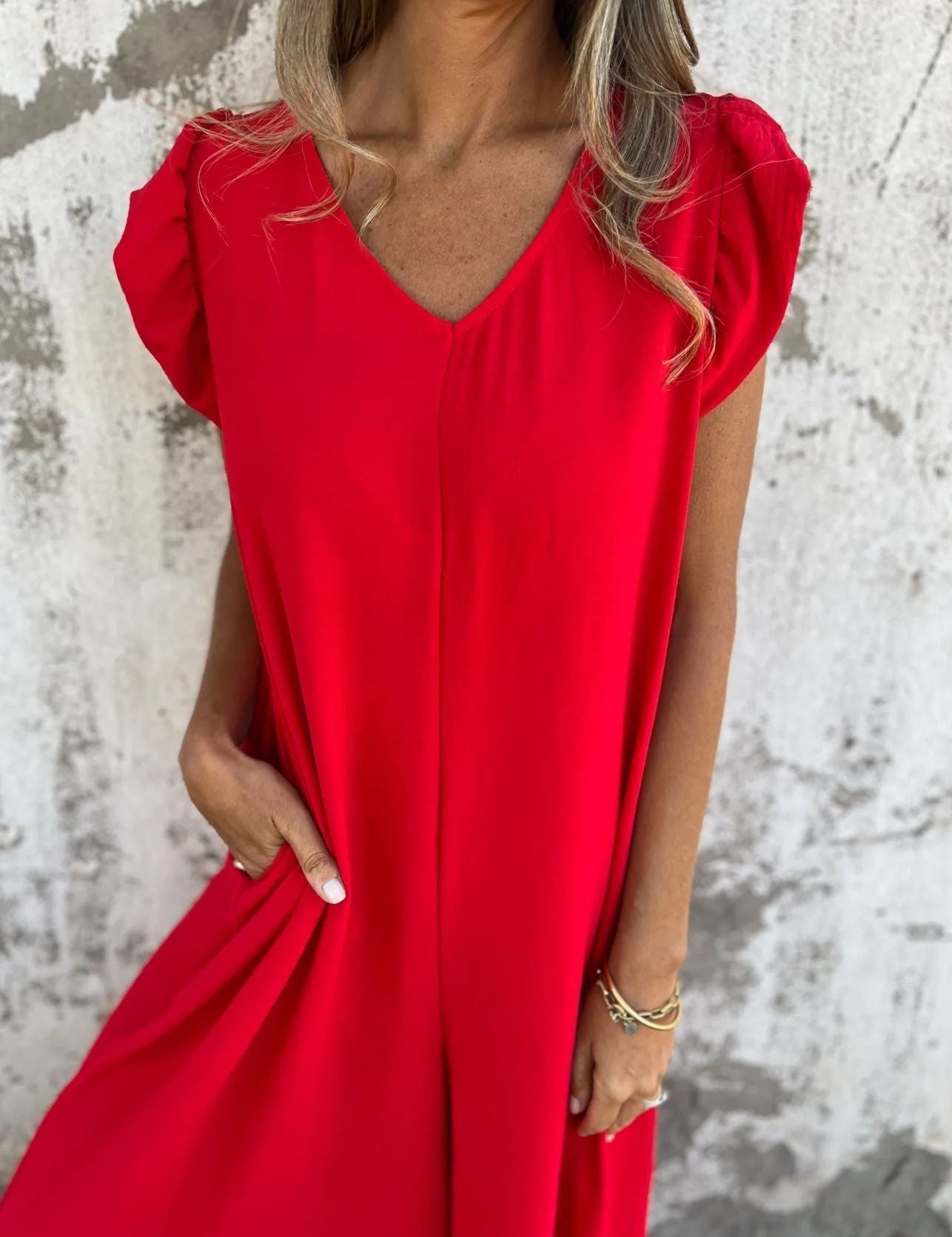 Mono sin mangas para mujer con cuello en V y bolsillos