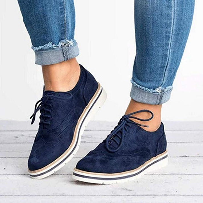 Zapatillas planas con cordones y diseño brogue para mujer