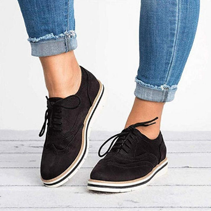 Zapatillas planas con cordones y diseño brogue para mujer