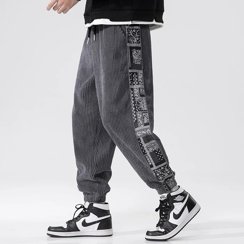 Pantalones de pana holgados estilo jogger para hombre con puños elásticos