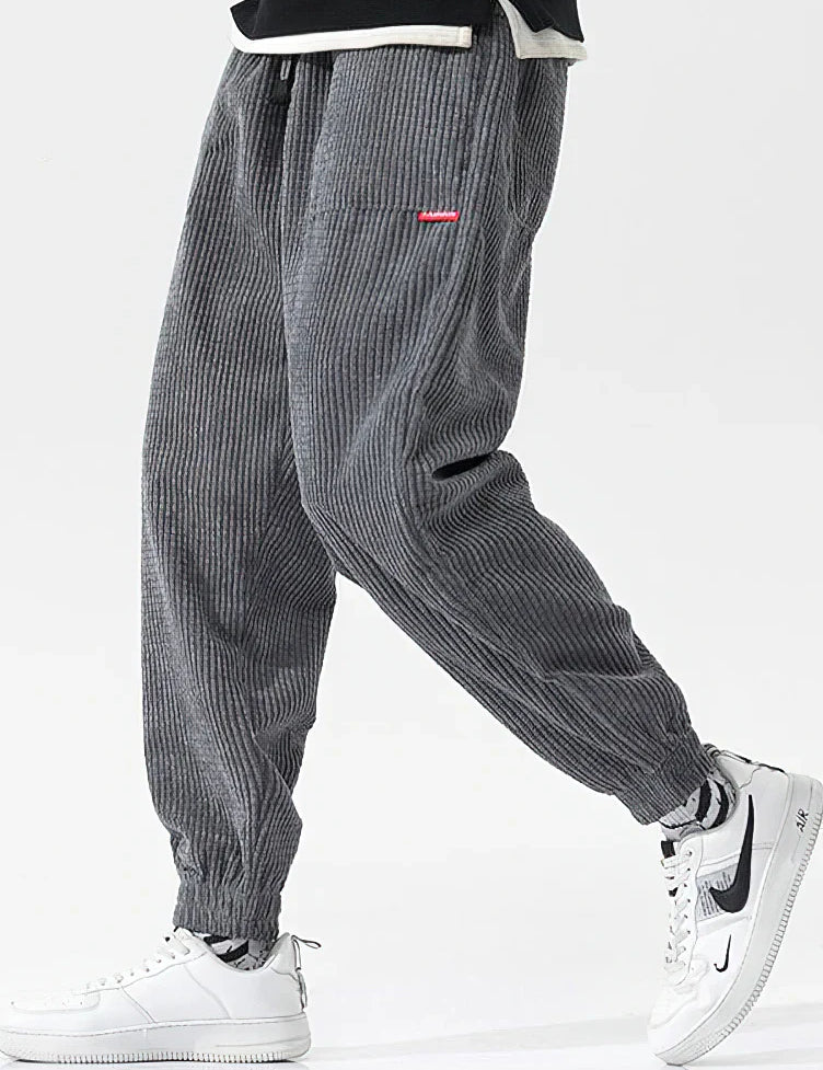 Pantalones holgados de pana para hombre, estilo joggers casuales con cintura con cordón.