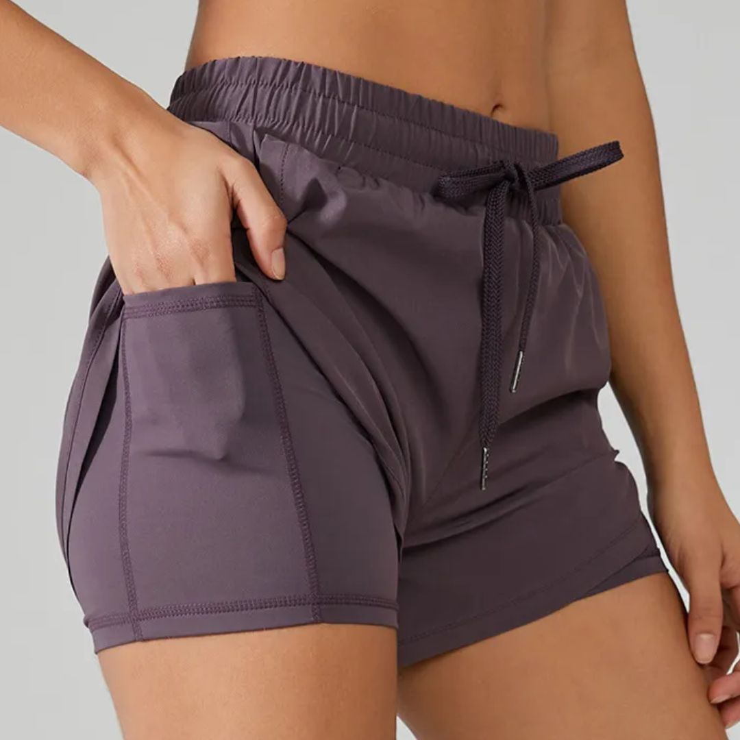 Shorts de baño para correr para mujer con bolsillo para el teléfono y forro interior