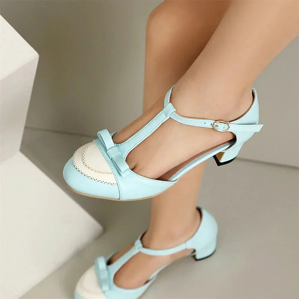 Tacones vintage con tira en T para mujer con lazo y tacón medio en bloque.